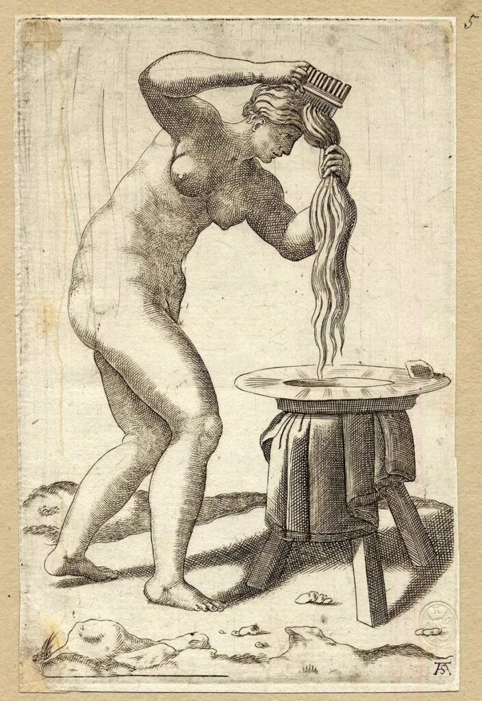 Engraving of a 16th-century woman washing her hair.