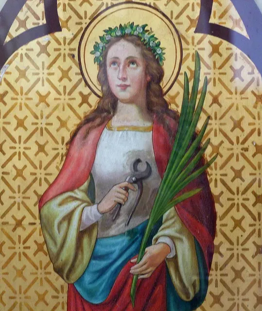 St Agatha holding the instruments of her own torture.