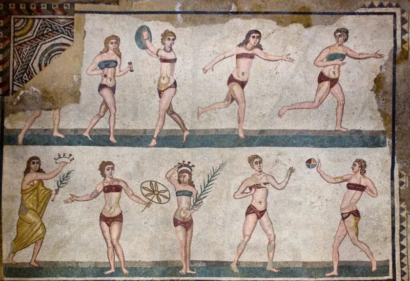 Ancient mosaic showing athletic activities, likely from Roman times.